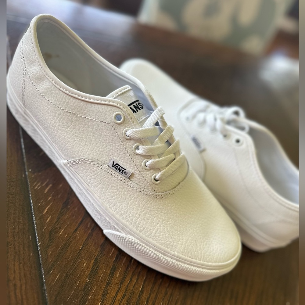 Brand new never worn white (leather) Vans **Size 10.5**
Retail: $60